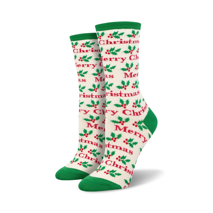 women's crew socks with christmas theme of red holly leaves, berries and the words 