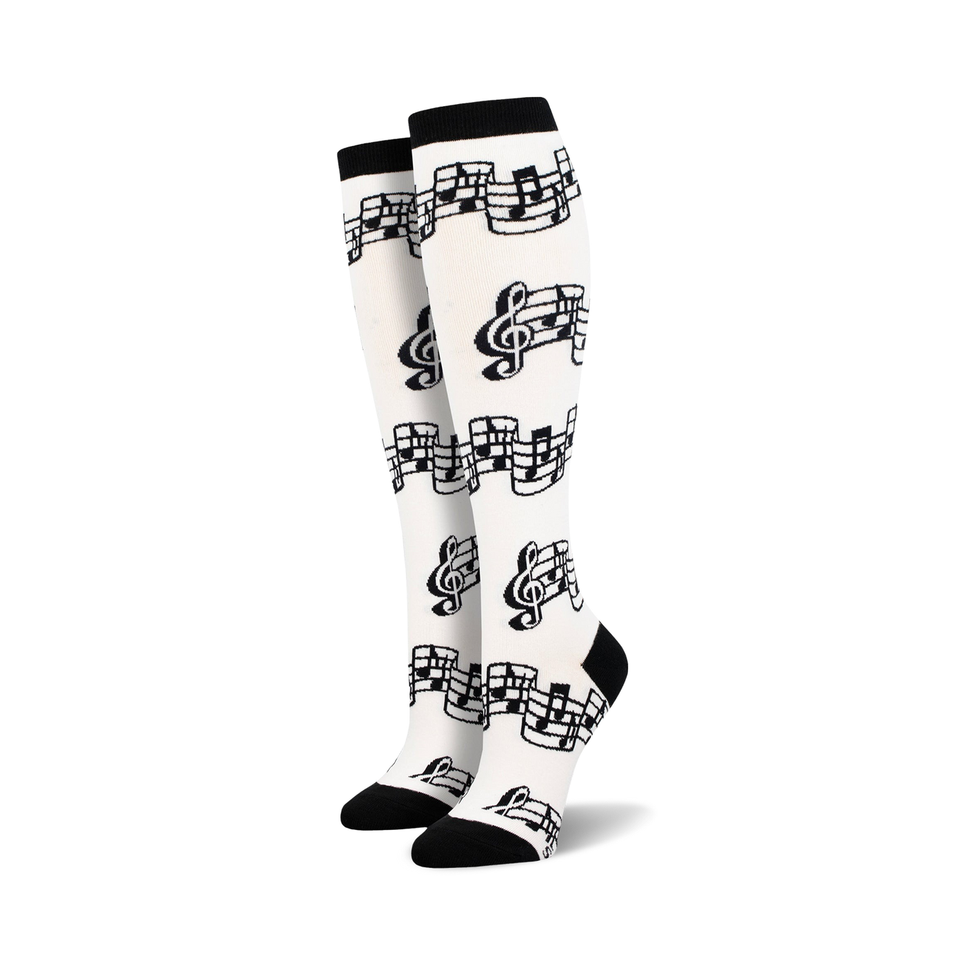 Pair of black and white knee-high socks with a musical notes and clef design.  