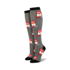 Pair of grey knee-high socks with a repeating pattern of red cans that say "Whoop Ass" and a wrench.  Black cuff.