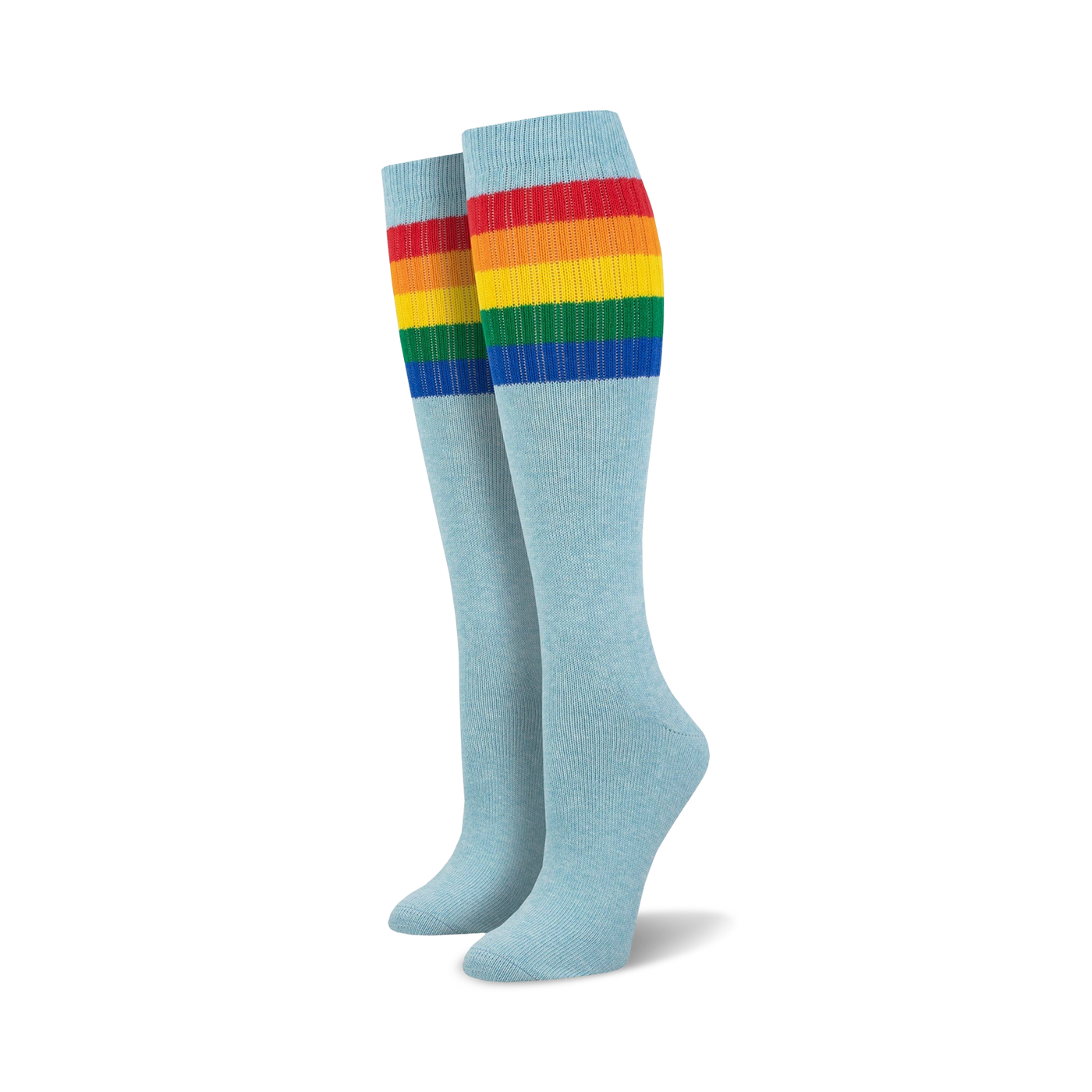 Pair of light blue knee-high socks with a vibrant rainbow striped cuff against a white background.