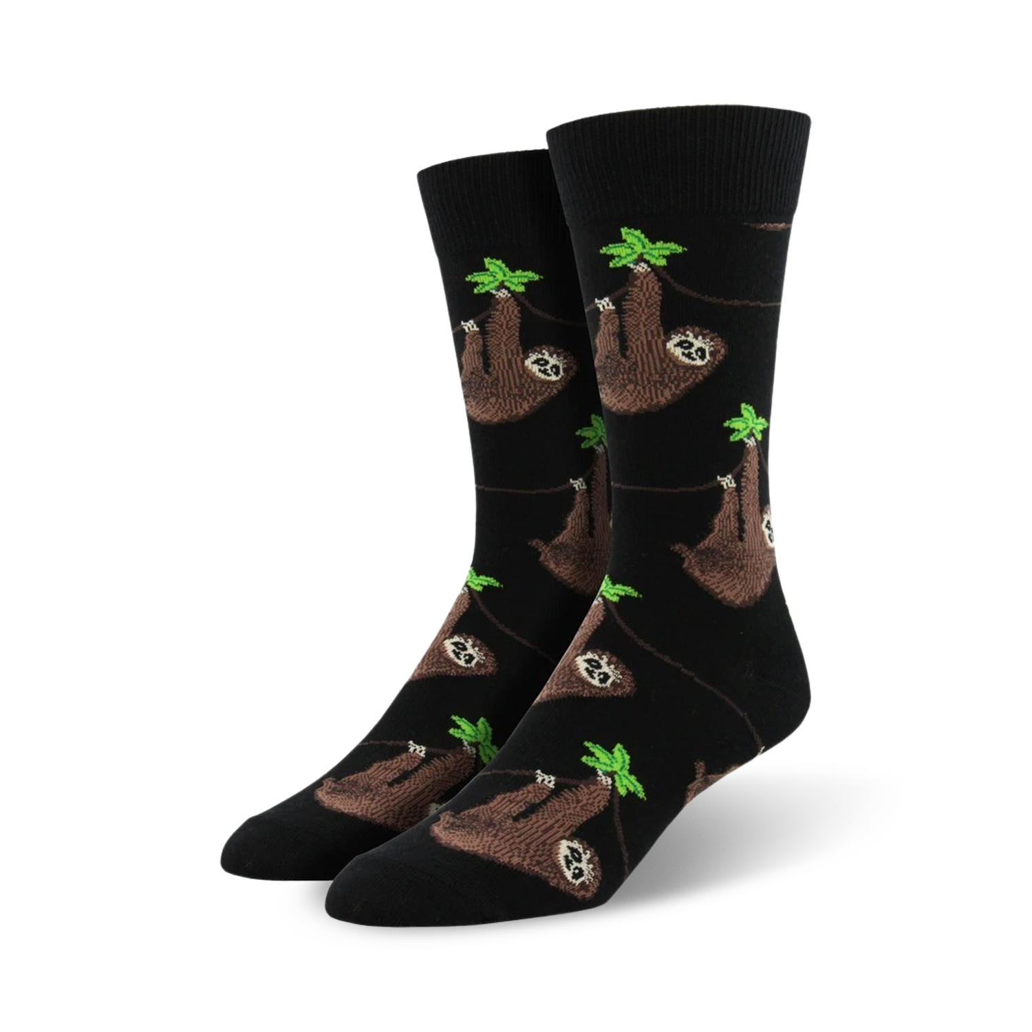 A pair of black crew socks with a repeating pattern of brown sloths hanging from green leaves. 