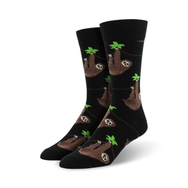 black crew socks with brown, cream, and black sloths hanging from green leaves.  