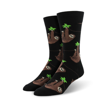 black crew socks with brown, cream, and black sloths hanging from green leaves.  