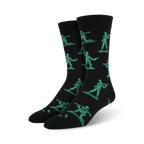 Pair of black crew socks featuring a repeating pattern of teal pixelated army men. Fun and playful design.