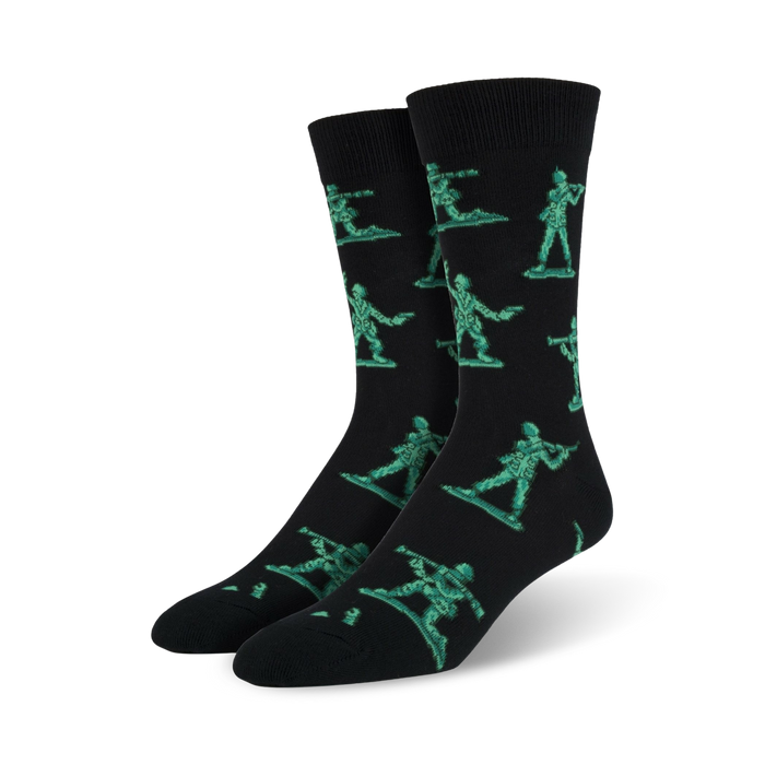 black crew socks for men featuring a pattern of green plastic army men holding guns.    }}