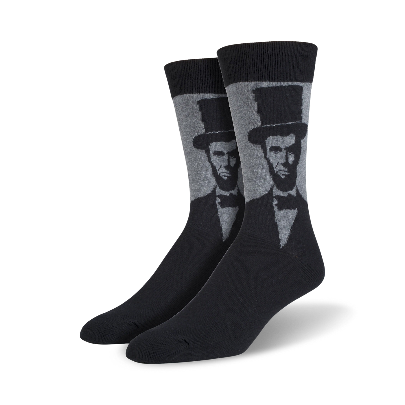 Pair of men's crew socks showcasing a grayscale portrait of Abraham Lincoln in a top hat.  Black and gray color scheme.