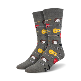 gray crew socks with guitar pattern in red, yellow, brown, white, and black.   