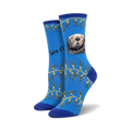 Crew socks in blue featuring a sea otter, kelp design, and 'Sea Otter' text.