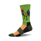 Crew socks in green, orange, black featuring a folk art style rooster illustration. The rooster is multicolored with yellow, blue and red accents.