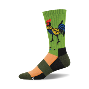 Crew socks in green, orange, black featuring a folk art style rooster illustration. The rooster is multicolored with yellow, blue and red accents.