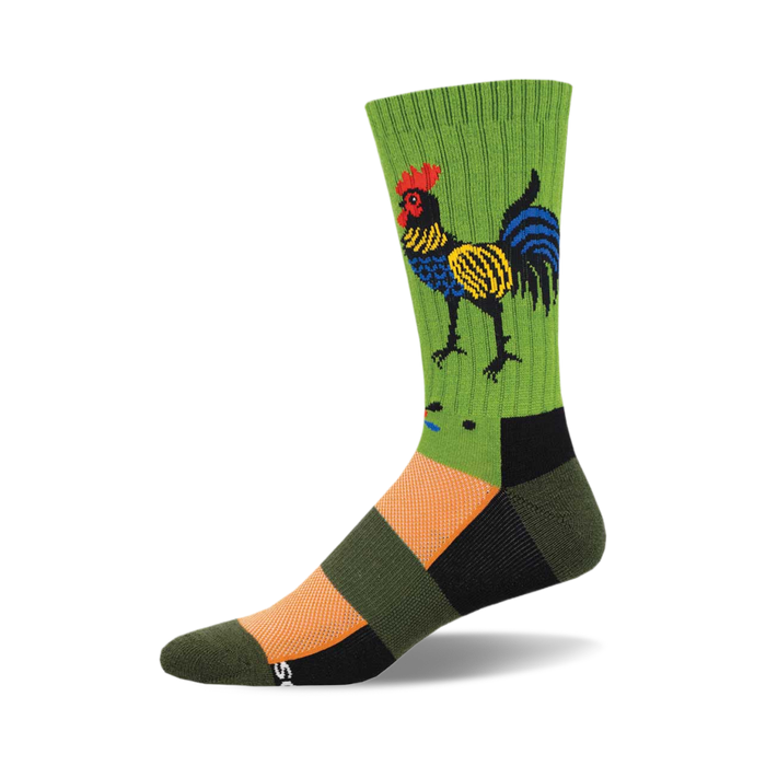 the folk art rooster socks are dark green with a multicolored rooster on the front. the rooster has red, yellow, blue, and black feathers. there is orange and black at the toe and heel of the sock and black at the top of the sock. }}