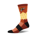 Brown and gold crew socks with a honeycomb pattern and a bee illustration.  Cozy and stylish!