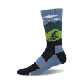 Crew socks in blue, green, and navy featuring a mountain scene and a cyclist biking uphill. 
