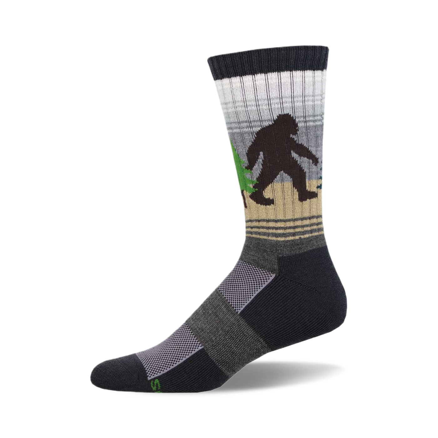 Crew socks in dark gray, beige, and white, featuring a Bigfoot walking through a forest.  Green trees and a subtle striped pattern.
