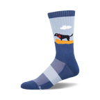 Crew socks in blue and light blue featuring a black labrador in a yellow canoe against a light blue sky background.