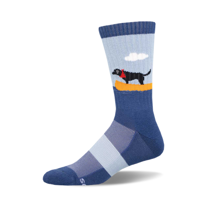 socks that are blue with a pattern of black dogs wearing red bandanas. the dogs are sitting in yellow canoes and there are white clouds in the background. }}