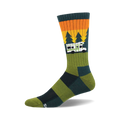 Crew socks in olive green, teal, and orange. Features a retro camper van graphic driving through a forest at sunset.