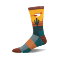 Crew socks in teal, orange, and brown, showcasing a desert sunset, cactus, and bird design.