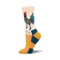 Cream crew socks with a folk art-style rooster in teal, orange, and navy.  The foot features teal and gold stripes.