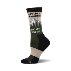 the sock is black, tan, and light olive green. the words 'get lost in nature and you will die' are written on the sock in a light olive green color. there are also mountains and pine trees in a dark olive green color.