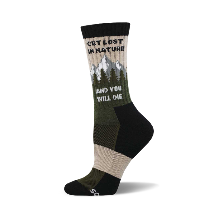 the sock is black, tan, and light olive green. the words 'get lost in nature and you will die' are written on the sock in a light olive green color. there are also mountains and pine trees in a dark olive green color. }}