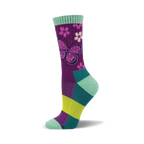 Crew socks in purple, teal, and lime green.  The main design is a pink butterfly and small flowers on a purple background.