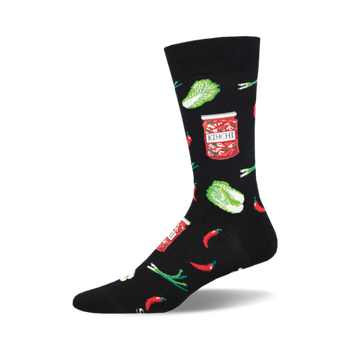socks that are black and have a pattern of kimchi, which is a korean dish made of fermented vegetables. the kimchi is depicted in a jar and also scattered around the socks with other vegetables, such as green onions and red chili peppers.