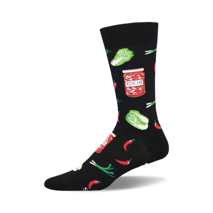 socks that are black and have a pattern of kimchi, which is a korean dish made of fermented vegetables. the kimchi is depicted in a jar and also scattered around the socks with other vegetables, such as green onions and red chili peppers. }}