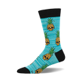 Crew socks in teal with a repeating pattern of pixelated pineapple skulls. Black cuff.