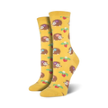Lifestyle shot of the yellow hedgehog socks, showcasing them on a person's feet.