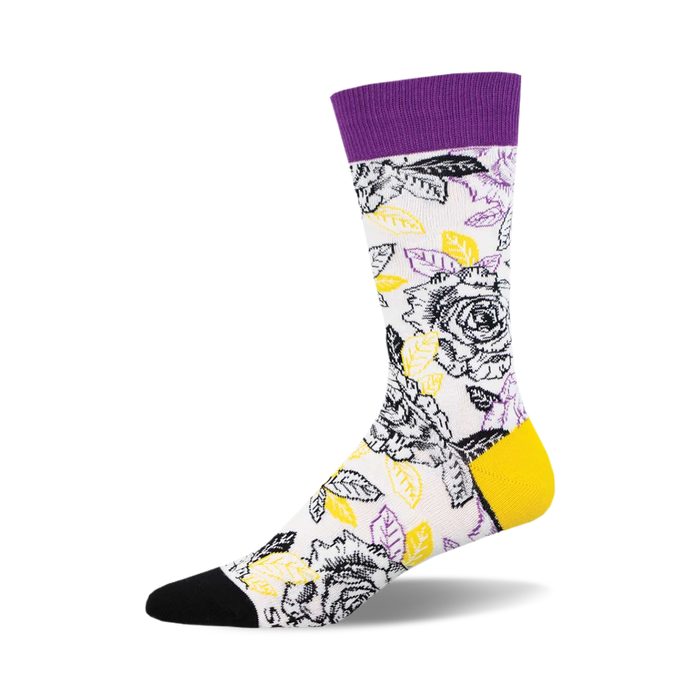 socks with a pattern of black and white roses with yellow centers and green leaves on a white background. the top of the sock is purple and the toe and heel are black. }}