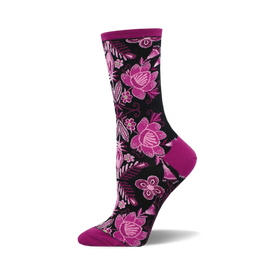 socks that are black with a pattern of pink and purple flowers and green leaves. the flowers have multiple petals.