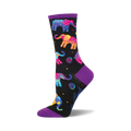 Black crew socks with colorful, patterned elephants and purple cuffs. Fun and vibrant design.