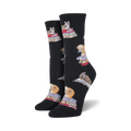 Pair of black crew socks with a repeating pattern of cats sitting on stacks of books.  Cats are orange and grey.