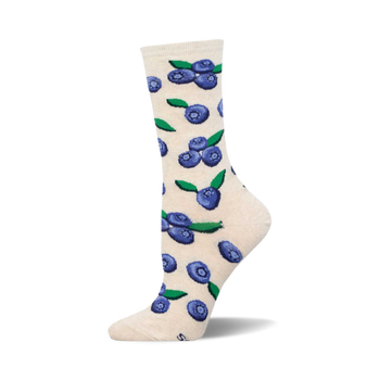 the off-white socks have a pattern of blueberries with green leaves.