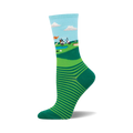 Crew socks in light blue, green, and white.  Feature a golf course scene with a golf cart and stripes at the bottom.