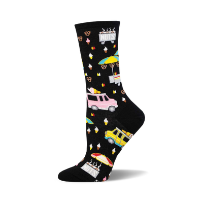 socks that are black with a pattern of colorful street food vendors. there are ice cream trucks, hot dog stands, and pretzel carts. the background is filled with small white dots.