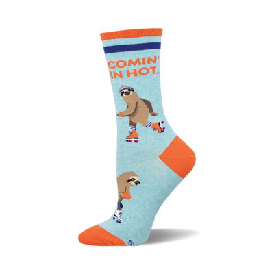 socks that are light blue with an orange toe, heel, and cuff. they have a pattern of sloths on roller skates. the sloths are wearing helmets and knee pads. the text "comin' in hot" is printed on the cuff in orange and blue.