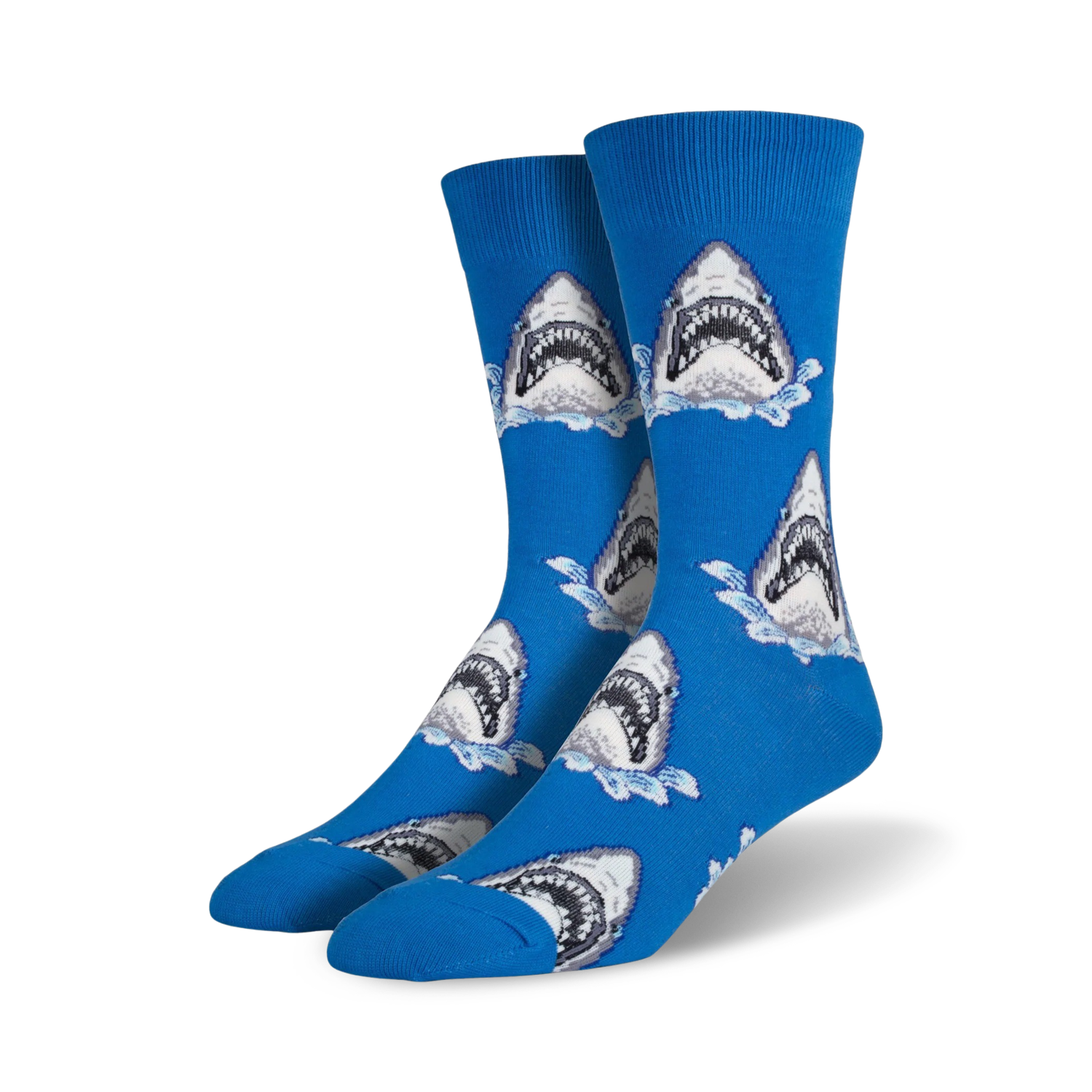 Pair of crew socks in blue featuring a repeating pattern of great white shark faces breaking the water's surface.