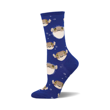 the blue socks have a pattern of pufferfish on them. the pufferfish are brown and beige with yellow eyes and black pupils. they are arranged in a repeating pattern all over the socks.