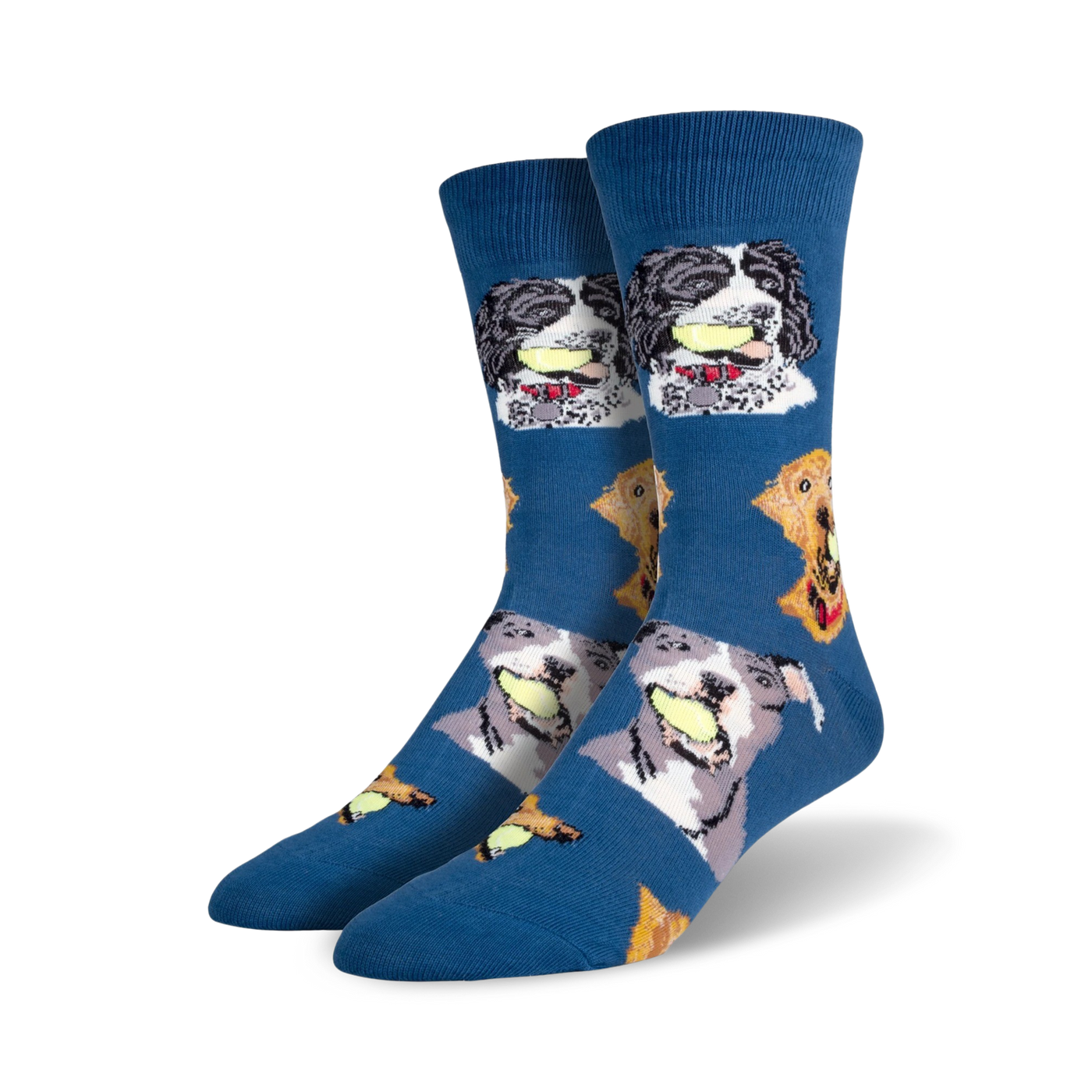 A pair of crew socks in blue featuring various dogs playfully holding tennis balls. The dogs are in shades of grey, black, and brown.