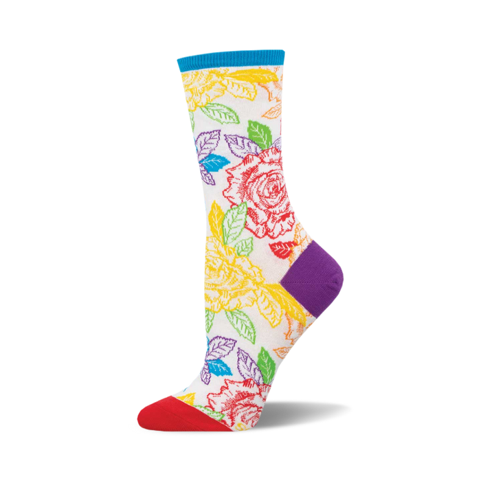 socks with a pattern of roses and leaves in various colors on a white background. the colors include red, orange, yellow, green, blue, and purple. socks with a red toe and a purple heel and cuff. }}