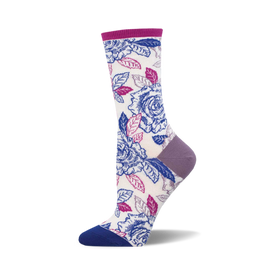 socks with a pattern of blue and pink roses with green leaves on a white background. the top of the sock is purple and the toe and heel are dark blue.