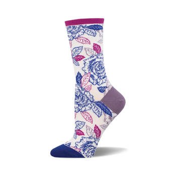 socks with a pattern of blue and pink roses with green leaves on a white background. the top of the sock is purple and the toe and heel are dark blue.