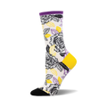 Crew socks with a white background featuring a black and white rose pattern accented with yellow and purple leaves.