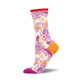 the off-white socks have a pattern of orange and purple roses with green leaves. the top of the sock is red. the heel and toe of the sock are purple.