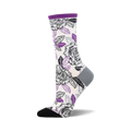 A side view of a women's crew sock with a white background and a pattern of black and purple roses and leaves. The sock has a grey heel and a black toe.