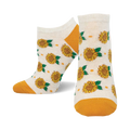 Cream ankle socks with yellow sunflowers, green leaves, and small orange dots.  Yellow accents at the heel and toe.