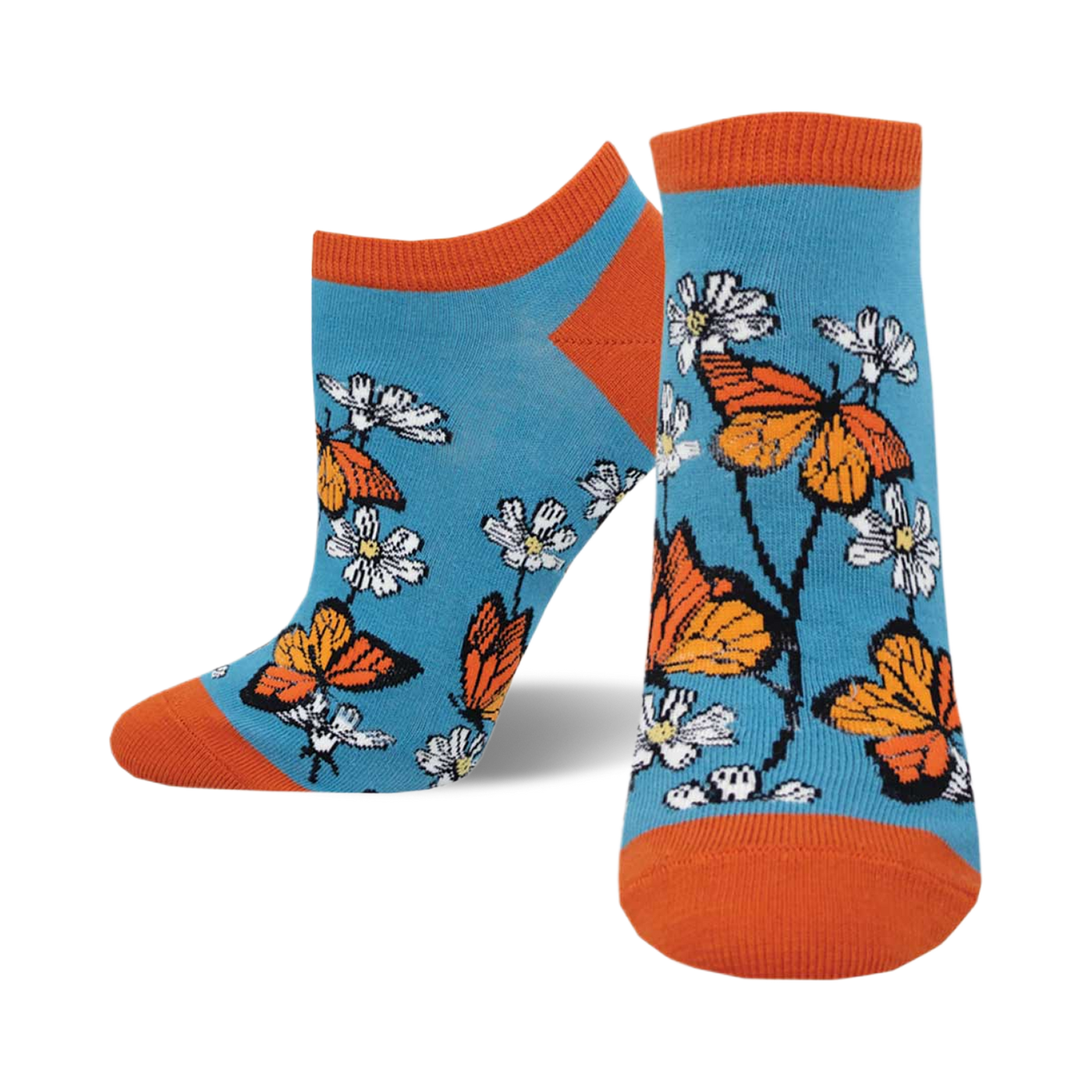 A pair of teal ankle socks adorned with orange monarch butterflies and white daisies. The socks have orange cuffs.
