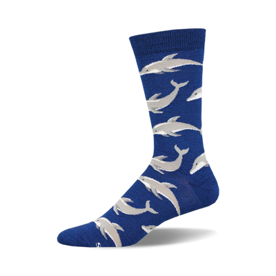 a pattern of dolphins in a light grey color against a royal blue background.